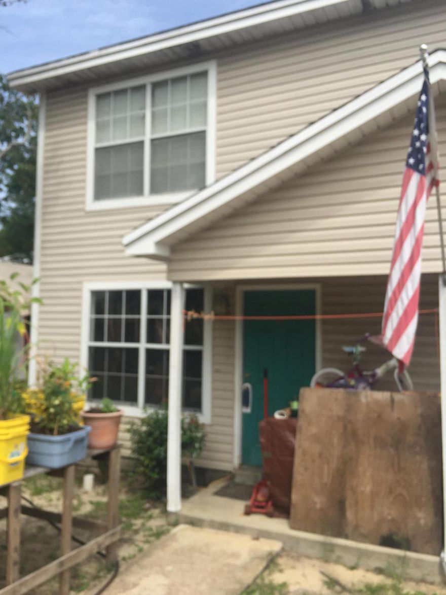 ATTENTION INVESTORS! SELLER WANTS QUICK SALE! This two-story unit is s-e-r-i-o-u-s-l-y spacious! Great living space and a huge kitchen and dining plus LOTS of storage on the ground level. Two bedrooms share a bath on the second level. Vinyl siding exterior provides easy maintenance. This is an end unit so there is side-entry into the fenced rear yard. This property is being sold As-Is only because the owner has always had it rented. Schedule your Showing!