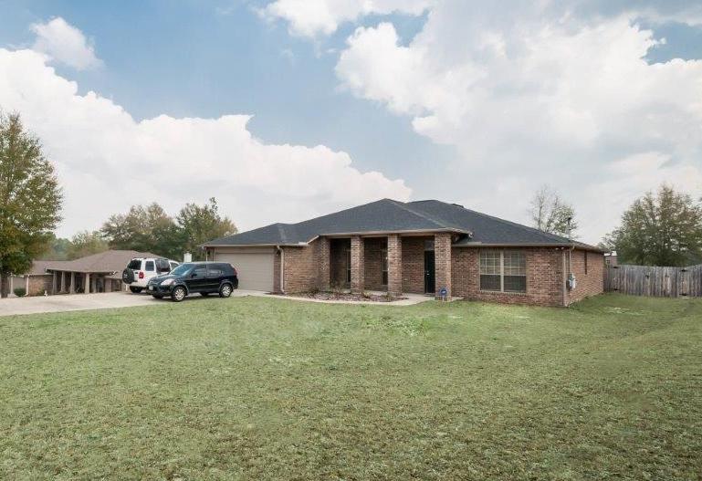 BEAUTIFUL HOME ON OVER HALF AN ACRE IN SILVER SPRINGS ESTATES WITH EXTENSIVE BACKYARD! THIS LOVELY BRICK HOME FEATURES AN OPEN FLOOR PLAN WITH 10 FT CEILINGS AND UPGRADES THROUGHOUT. SPACIOUS KITCHEN WITH ELEGANT DARK MAHOGANY COLORED CABINETRY WITH ALL STAINLESS FIXTURES AND PULLS, HIGH END GRANITE COUNTERTOPS, BUILT IN UTILITY ISLAND, LARGE BREAKFAST BAR, WALK IN PANTRY AND STAINLESS STEEL UNDER MOUNT SINK, MICROWAVE, DISHWASHER AND STOVE. CERAMIC TILE IN ALL COMMON AREAS OF HOME AND BATHROOMS. UPGRADED CARPET IN ALL THE BEDROOMS AND THE STUDY. DOUBLE FRENCH DOORS LEADING INTO DINING ROOM FROM THE KITCHEN, AS WELL AS THE ENTRANCE OF THE STUDY. THE HUGE BACK YARD INCLUDES A NEW 10X22 VINYL TIN ROOF SHED.