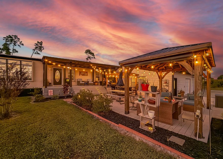Welcome to 242 N Comet Ave in Panama City, FL, a 1.82-acre retreat with a 3BR/2.5BA home and private mother-in-law suite. Inside you'll find 9' ceilings, crown molding, LED lighting, tile floors, Corian countertops, and black stainless appliances. The master bedroom offers double doors and an oversized shower, while a dedicated office nook adds convenience. Guests will love the separate 320 sq ft mother-in-law suite with full kitchen, bath, and laundry. Outdoor living shines with a covered Trex porch, outdoor kitchen and gazebo, pool with privacy surround, and Bluetooth speakers. Extras include multiple storage buildings, a large garage, RV hookups, and smart upgrades. Full update list is in the Documents section. Schedule your showing today!