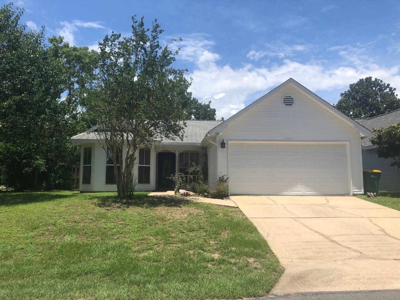 Welcome to Blue Pine Village! This charming community features a pool and a boat/RV storage area. This home offers 1178 SF with 3 bedrooms, 2 bath, and a screened in porch. The living area is spacious with a stone wood burning fireplace. There is new carpet in the bedrooms and then tile throughout the remainder of the home. Blue Pine Village is conventiently located to Bluewater Elementary, EOD School, Mid-Bay Bridge, and other shopping and dining areas. Lawn service is included!