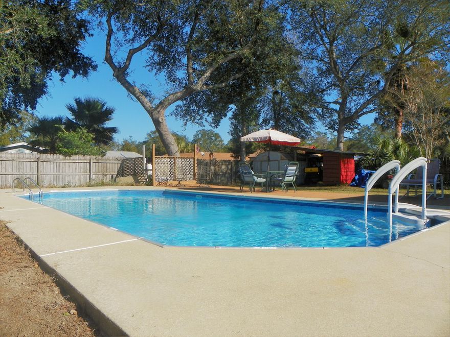 MOTIVATED SELLER! Great location in the heart of Niceville! Just minutes from schools, shopping and Eglin AFB! Oversized in ground pool, 4 bedrooms, 2.5 baths, 2 living areas and GREAT lot! Walking distance to public boat ramp and close to Lion's Park. Electrical has been completely rewired in 2015, new roof installed with 30 years shingles (August 2017), and Seller will replace HVAC (interior/exterior) with full price offer.Lots of outdoor space to entertain and enjoy the sparkling in ground pool and large back yard. Home offers lots of living space with Family Room off of Eat-In Kitchen, AND Formal Living Room. Family Room features gas fireplace and built-in bookcases.Upstairs you'll find the Master Bedroom and Bath and 3 additional bedrooms and 1 full additional bath. Call to see today!