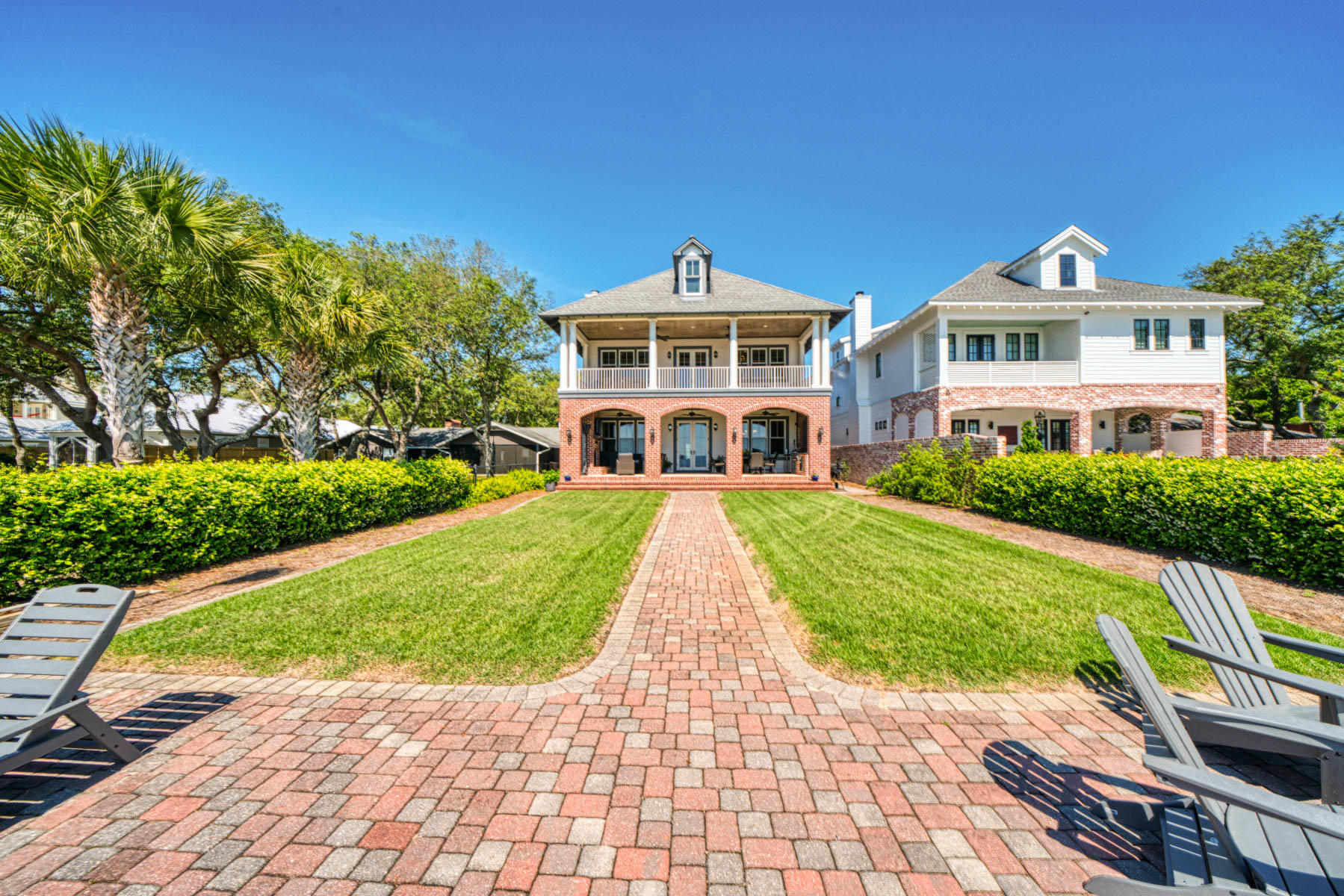 Enjoy breathtaking views of Choctawhatchee Bay from 1488sf of covered porches! This custom built waterfront home is spectacular; built to last a lifetime with all brick/Hardy board plank exterior, Go Bolt system on all exterior walls, all hurricane windows and doors, and closed cell insulation binding it all together. Hardwood or travertine flooring throughout majority of house. 3 natural gas fireplaces in LR, MBR, and outdoor porch. Custom built cabinetry throughout house, with granite kitchen and marble bathroom countertops.Thermador appliances. 10' ceilings throughout house.12' ceilings in garage. Pavers used for driveway and walkaways. 10' Navy seawall with 150' dock with second floor sitting area and 9,000 lb. boatlift. SS outdoor kitchen includes a kegerator!Well & sprinkler