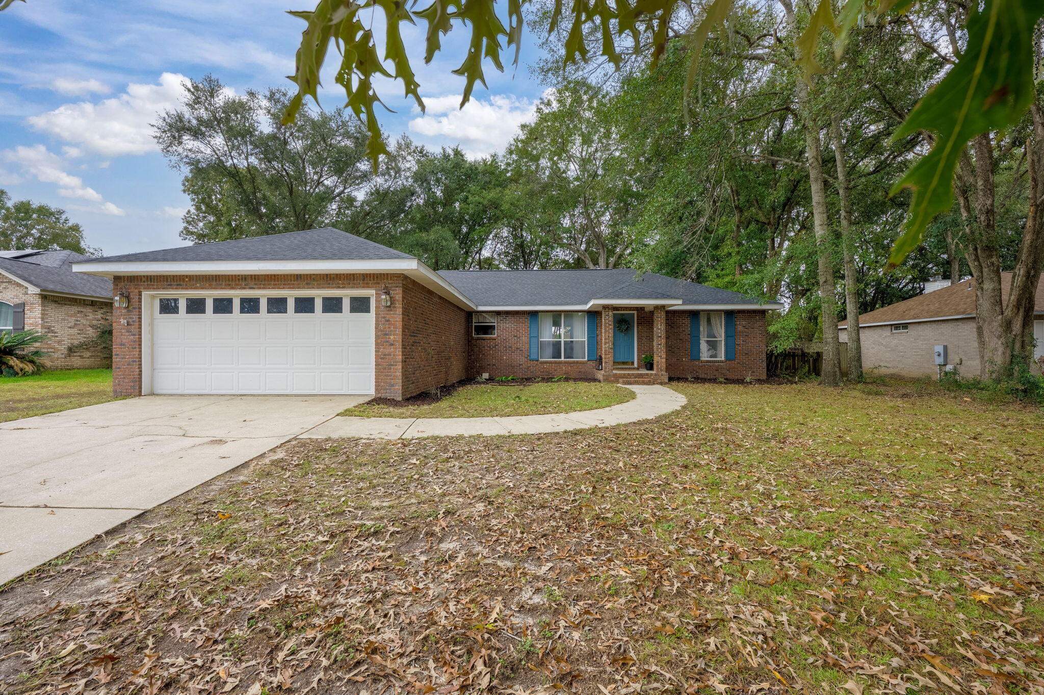 Welcome home to this fantastic 3 bedroom, 2 bath brick house on 1/3 acre in Crestview with a NEW roof. This split bedroom floor plan has a big kitchen, with white cabinets, a window over the sink, and a big breakfast bar for casual dining or entertaining. The kitchen has a pantry and is open to the dining room and spacious living area where you'll enjoy the view from the large windows which let in lots of natural light. The master bedroom has a walk in closet, and the en suite bathroom ALSO has a walk in closet! The master bedroom and living room each have access to the enclosed Florida room, which has a ceiling fan and is heated/cooled for your comfort, adding a second living area to enjoy year round; windows slide open to allow the fresh air in, or close them and enjoy air conditioning. The Florida room has a great view of the privacy fenced backyard where mature trees provide shade. This big backyard has a fire pit and you won't believe the amazing sunset views!  
The HVAC is about 4 years old. This home has a double car garage, indoor laundry room, lovely cul-de-sac with much less traffic than a through street, and a beautiful little neighborhood with no homeowner's association.  This property is just on the outskirts of town, conveniently located about a mile off of Hwy 85, and approximately 14 miles to Duke Field or 7th Special Forces Group. North Crestview has a country feel and yet the amenities of a growing community: schools, medical facilities, recreation, shopping and it's only about 35 miles to the sugar white sandy beaches of Okaloosa Island.  This house is all brick, with a big lot, and a great floor plan...ready for the new owners to call it home. 

All information believed to be accurate, buyer to verify all facts of importance.
 