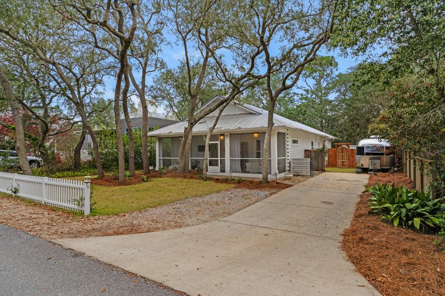 Welcome to your dream coastal retreat! Nestled in a charming beach community, this home boasts an array of desirable features perfect for both personal enjoyment and investment potential. As you approach the property, you'll notice the inviting curb appeal with fresh new paint and a newly sodded lawn framing the sizable yard. The absence of an HOA provides you with the freedom to personalize and utilize the space as you wish, whether it's for relaxation, entertaining, or potential rental income. Step inside, and you'll be greeted by the warmth of natural light cascading through newly installed shiplap walls, creating a cozy yet modern ambiance. The spacious living area seamlessly transitions into the updated kitchen, complete with sleek countertops, stainless steel appliances, and ample