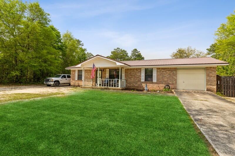 Come check out this three bedroom, one-and-a-half-bathroom home in DeFuniak Springs! This is an opportunity for a a starter home or fixer-upper. It is move-in ready and boasts a one-car garage, a workshop, and is located on a one-acre lot with plenty of landscaping possibilities. It also has a newly installed water heater, a metal roof, and some updated vinyl flooring. Don't miss out on this opportunity, schedule a showing today!Buyer to verify any and all information deemed important to them.