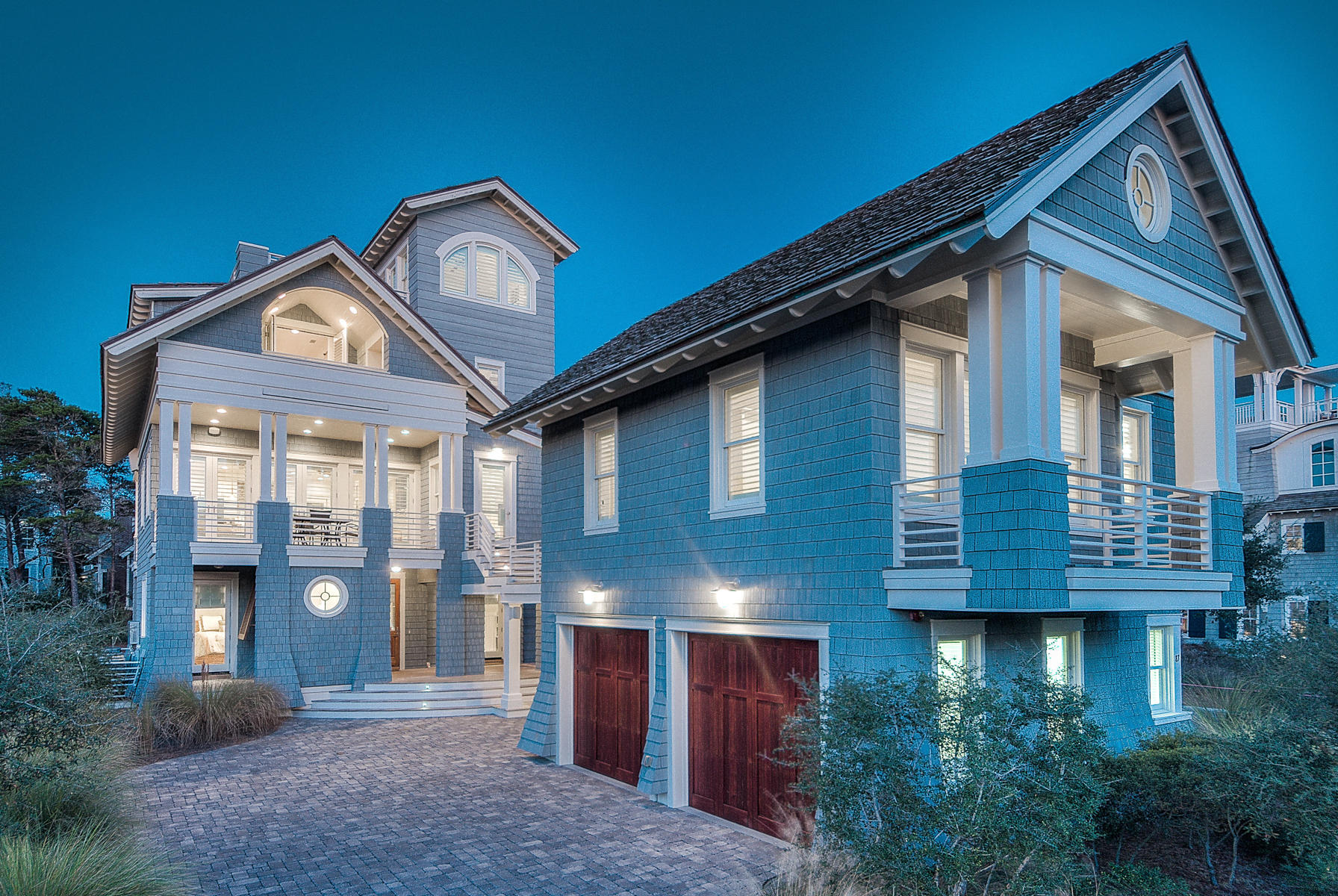 The bird's eye views of this sophisticated four-story tower home are outstanding, but this luxury residence is no less impressive from the ground. Situated in the exclusive community of WaterSound Beach is this coveted home. The bespoke architectural features envisaged by architect Dawn Thurber include a half moon window above a protruding balcony, airy louvered doors and durable Ipe hardwood decking that would grace any luxury sail boat. Every interior inch of this luxurious cedar-shingle home has been thoughtfully designed by Georgia Carlee to provide relaxed beach-style living in one of Florida's most exclusive communities.