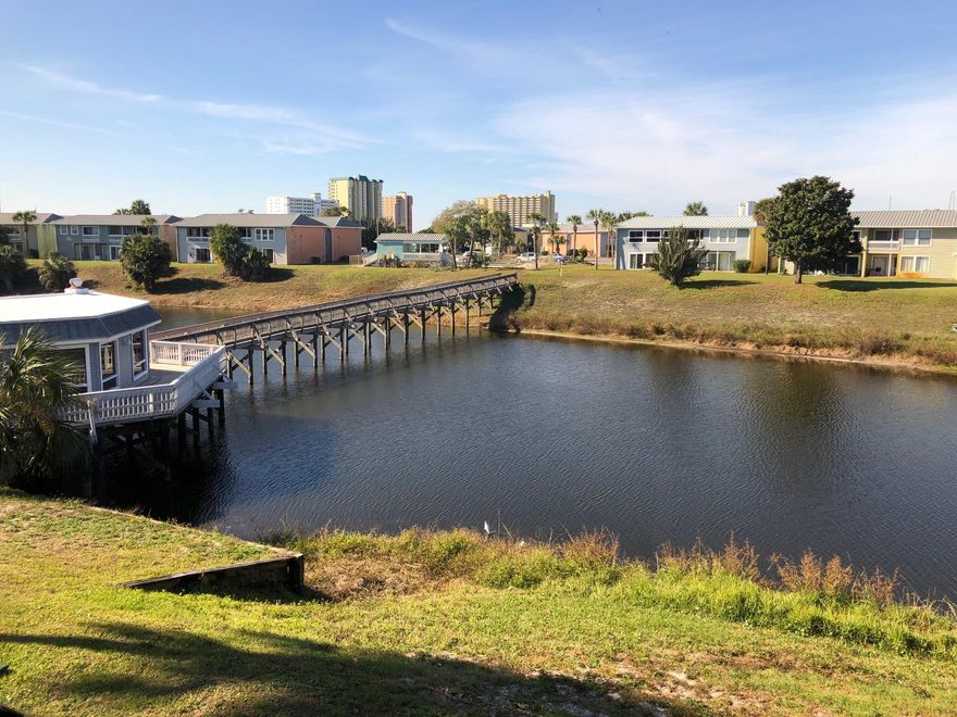 Awesome view of the Lake. Affordable one bedroom Condo. Partially Furnished. Washer/Dryer hook up. Newer flooring, Newly painted. Side by side stainless steel sink, Expanded interior giving more sq. ft. Next to pool & Community Room. Convenient location in the heart of Destin. Long term or short term rentals. Amenities include: 3 pools, tennis courts, laundry facilities, grills and community room. Close to beaches, entertainment & shopping. Buyer to verify all dimensions. Amenities Include everything except electric.