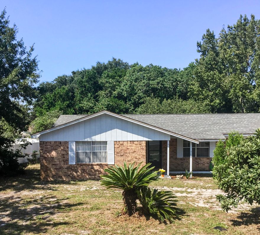 PRICE REDUCTION! Minutes from the beach, shopping and some of the best restaurants on the Emerald Coast. This wonderful home has new carpet, new paint, new water heater, and new interior doors. The home boasts a mix of original features with low-maintenance living and comfort. The home has large sized rooms that add an extra element of comfort and functionality to this great property. A large, light-filled living room is a great place to relax after a long day. The well-equipped kitchen has brand new counter-tops and lots of cabinets for plenty of storage. The home sits on a large fenced lot with a nice size patio great for enjoying the outdoors. One year home warranty. Come see this home it won't last long. MOTIVATED SELLERS! BRING ALL OFFERS!!!Rural Housing 100% financing.