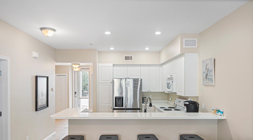 PRICED BELOW COMPS TO SELL!!! Fully furnished 2BR/2BA first-floor condo in the sought-after gated community of The Village at Blue Mountain Beach! Just 1/2 mile from public beach access, this turn-key rental is ready to go. Enjoy top-notch amenities: a large pool, fitness center, shuffleboard, and outdoor grill stations. Walk to delicious dining, including Mimmo's Italian and a nearby ice cream shop. Shopping and entertainment are just minutes away. Whether for personal use or investment, this condo offers the perfect blend of comfort and coastal convenience!