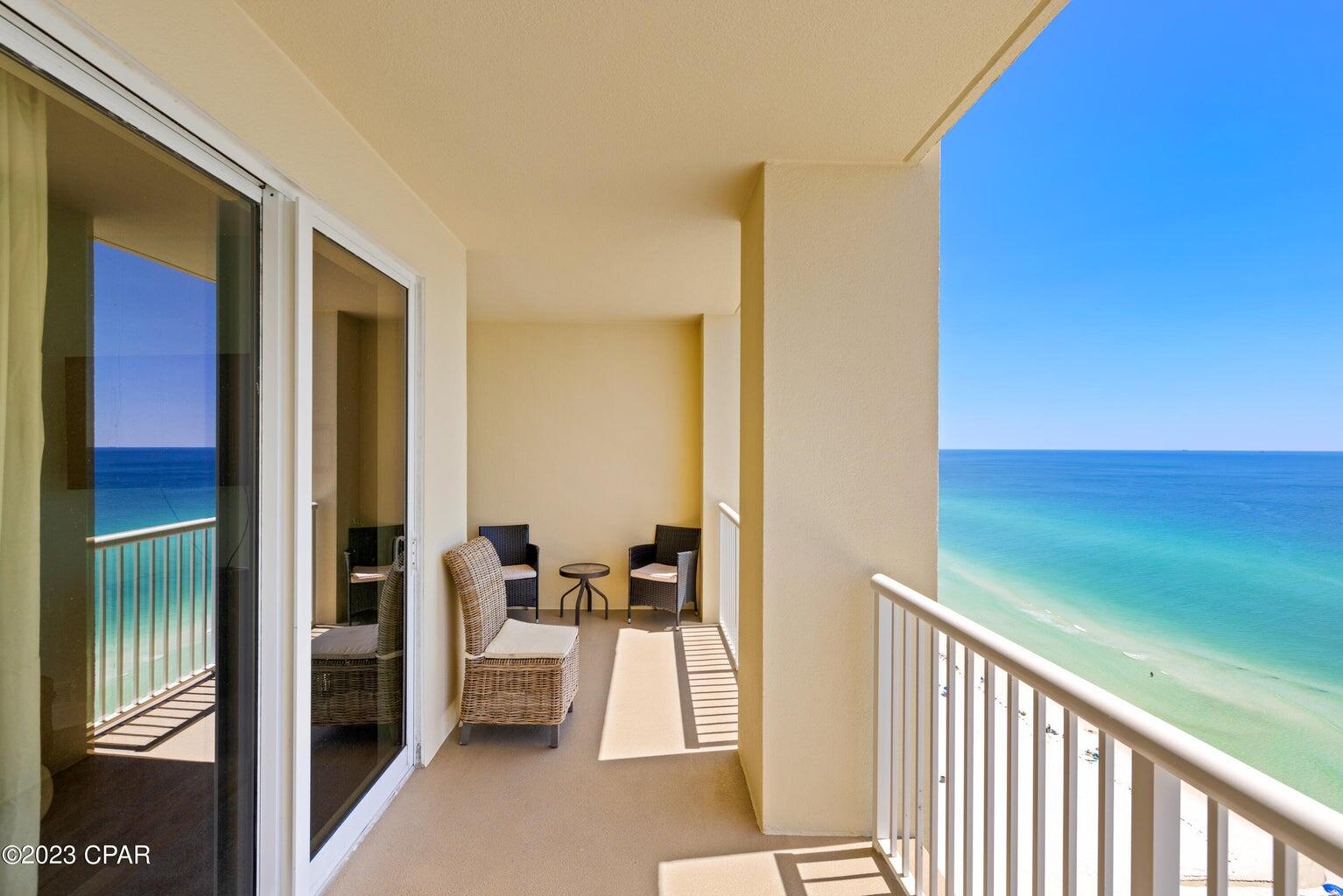 A new favorite Gulf-Front Condo at the gorgeous Grand Panama Resort! We love this resort & this stunning unit! This unit boasts wonderful characteristics such as a bunk area (which means this unit sleeps like a 3 bedroom without the higher price!), luxury vinyl plank flooring throughout the unit, Gulf Front master suite complete with sliders that open to the spacious balcony. Not to mention, the unit is being sold furnished making it turn-key, rental ready! This is one of the few PET FRIENDLY beach resorts. The Grand Panama Resort has awesome amenities including 2 pools, poolside tiki bars that serve drinks & food, hot tubs, general store, onsite bistro, fitness facility & generous covered parking complete with a walkover for easy access! Grand Panama is also loved for its wonderful central location that is near great dining such as the Firefly, Pineapple Willy's & Saltwater Grill. Added bonus this complex is VA loan approved