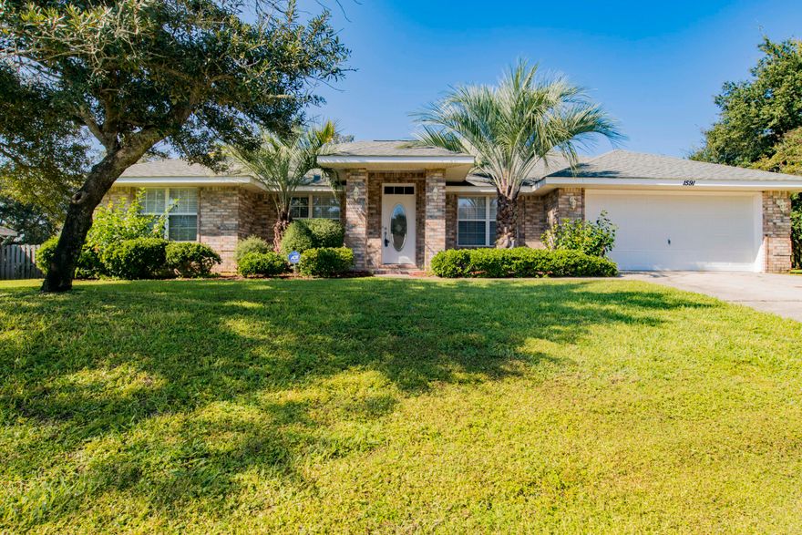 Nestled in the desirable neighborhood of Woodlawn Heights on a Cul-de-Sac, this 4 bedroom, 3 bathroom home has been newly renovated! Upon entering, you'll notice the beautiful wood looking tile, new carpet, and new light fixtures. The kitchen has brand new granite, backsplash all new stainless steel appliances, plumbing hardware and fixtures! You'll enjoy the breakfast nook, formal dining room and the open split floor plan allowing for privacy in the master suite. The master bathroom has new granite and sinks, toilets as well as new plumbing hardware and light fixtures and features a garden tub, separate shower and huge walk in closet. Another great feature of this home is a huge second master with private bathroom with a private entrance to the patio into the fully fenced back yard. Perf