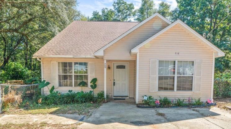 Don't miss your opportunity to own this adorable 4 bedroom, 2 bath home located on almost a quarter of an acre for less than $250k!! Conveniently located to school and shopping. Entire interior has new paint, bathroom vanity and light. Roof and hot water heater both replaced in 2016. Shed for extra storage or man cave in back yard. This awesome lot backs up to a secluded creek and is within walking distance to Lyons park! -