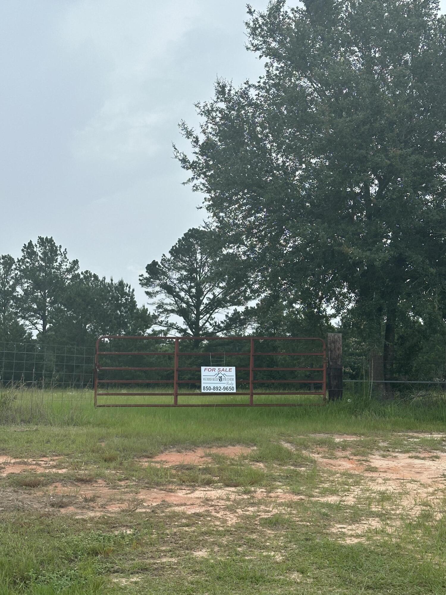 13.82 acres of county living while being less than 10 miles to Downtown DeFuniak Springs. The sandy white beaches of South Walton County are an hour away. The location of this property also provides an easy commute to Eglin AFB, the I-10 corridor, local lakes and springs. Approximately 9 acres are fenced pastureland, while the remaining acreage is covered with mature hardwoods. At the back of the property you will find beautiful, clear Turkey Creek. Bring your horses and your dream home plans. Mobile/Manufactured homes are allowed. Private well and septic tank required.