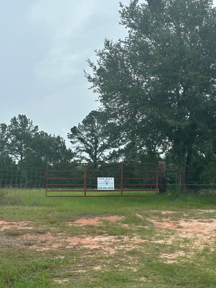 13.82 acres of county living while being less than 10 miles to Downtown DeFuniak Springs. The sandy white beaches of South Walton County are an hour away. The location of this property also provides an easy commute to Eglin AFB, the I-10 corridor, local lakes and springs. Approximately 9 acres are fenced pastureland, while the remaining acreage is covered with mature hardwoods. At the back of the property you will find beautiful, clear Turkey Creek.  Bring your horses and your dream home plans. Mobile/Manufactured homes are allowed. Private well and septic tank required.