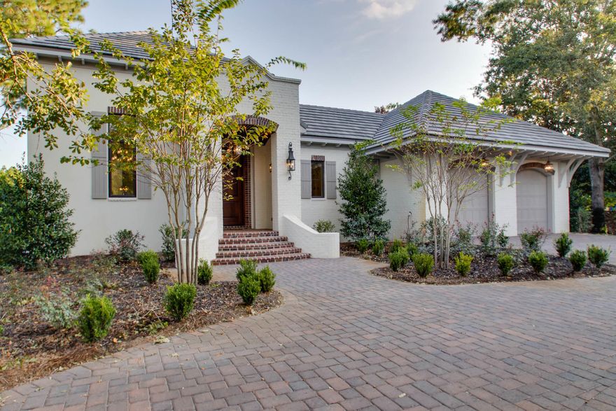 Burnt Pine in Sandestin Resort. This new-construction home has amazing outdoor living with 5597 Square feet under the roof. and 3941 square feet heated can cooled. Featuring high-end appliances by Wolf-Sub Zero, a heated salt water pool, golf course views, an elevator, wood flooring, designer tiles, custom architecture, and an outdoor kitchen with an outdoor fireplace. This home has major wow factor! The large great room features a 13.5' stacked marble wood and gas burning fireplace. Enjoy two master suites; one upstairs and one down. The white painted brick New Orleans style courtyard provides privacy for the large screened in pool with an outdoor kitchen. This home is very high-quality construction with over the top features like concrete tile roofing and impact doors and windows