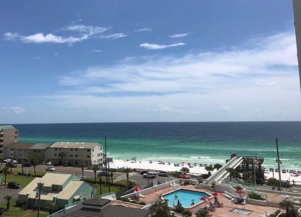 This beautiful condo is updated with a stylish decor. Expansive view of the Gulf of Mexico and ready for you to enjoy the fabulous beach lifestyle. You can make vacation memories and also cash in $$$ on rentals, sleeps up to 8 people. Easy access to the beach via the sky bridge and located on the popular pedestrian/ bike path with many fun restaurants and attractions in the area. Lots of great amenities including , pool, hot tub, tennis, basketball, fitness center, and onsite restaurant. There is covered parking for owners, not assigned.