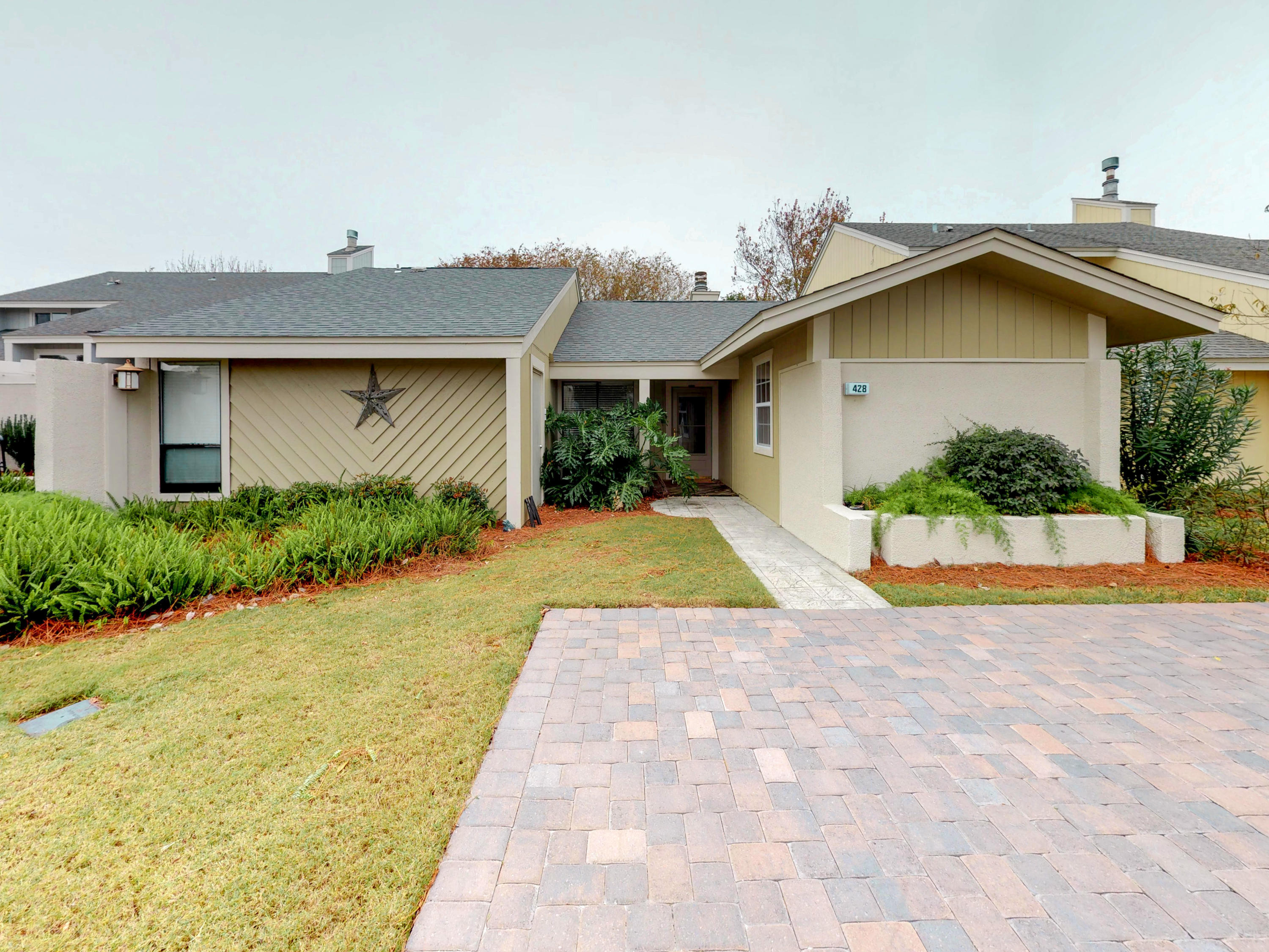 You will absolutely love this 3/2 cottage, all on one floor, inside the gated community of Sandestin. Relax on your large back patio with a great view of the bay and of the golf course -- making this a super place for entertaining. It just received a new driveway of pavers as well as the outside has also received a fresh coat of house paint in December, 2017. You will be happy to know that you have 3 bedrooms, one of which has double bunk beds. Family will love coming here and you will not want to leave. It is bright and airy and comes furnished. It has a laundry with a full size washer and dryer too. It has a great rental history and rental income. Call today to see it.