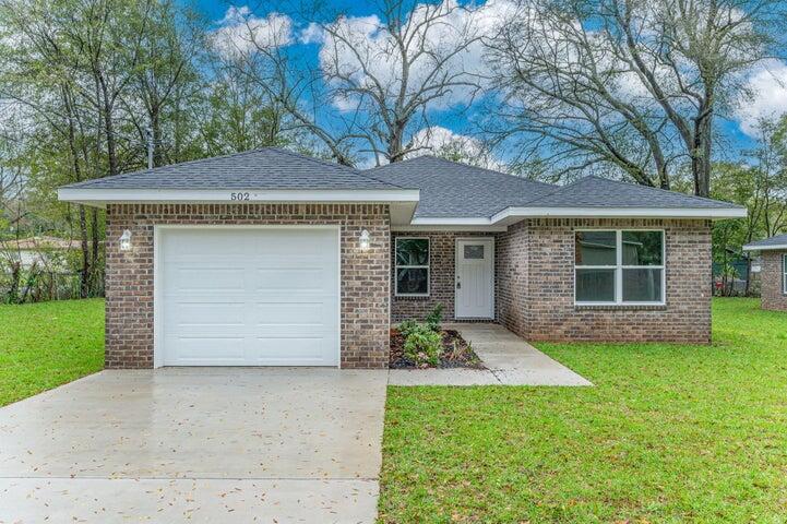 All Brick, New Construction home available, no HOA, In the heart of Crestview! It's only 21 miles from Eglin AFB, 10 miles from Duke Field, 5 miles from several grocery stores & only 0.7 miles from downtown yes walk & enjoy the community scheduled events. All Luxury Vinyl Plank flooring throughout, perfect for pets! Open design concept, with Lennox energy efficient A/C system installed, huge front/back yard just in time for Spring with 6 ft privacy fence perfect for kids & pets, garage, well maintained yard, white Carrara quartz countertops within your new home including bathrooms. Tray ceilings in dining area & primary bedroom for added drama. Washer, dryer, television & an electric fireplace all included. All its missing is you! Photos of similar completed home via builder! Staged!