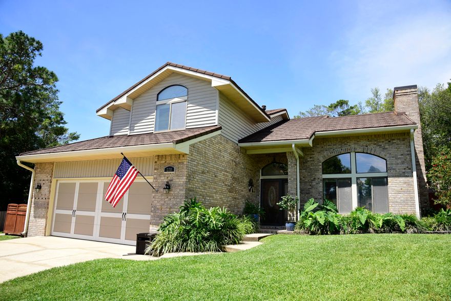 WOW! This is the one you've been waiting for! Beautifully updated throughout from floor to ceiling! All popcorn has been removed, new hardwood flooring, new paint, crown molding, new doors, new lighting, fixtures, and hardware. Formal living room features decorative ceiling, new fireplace with LED lighting, new chimney crown and mantel. Kitchen has newer stainless steel appliances. All bathrooms have been completely redone! New water heater, newer HVAC, new privacy fence. Backyard has been sodded and 30 trees removed. Many more upgrades and improvements, too numerous to mention. It also comes with a whole house generator! This house is definitely a MUST SEE!