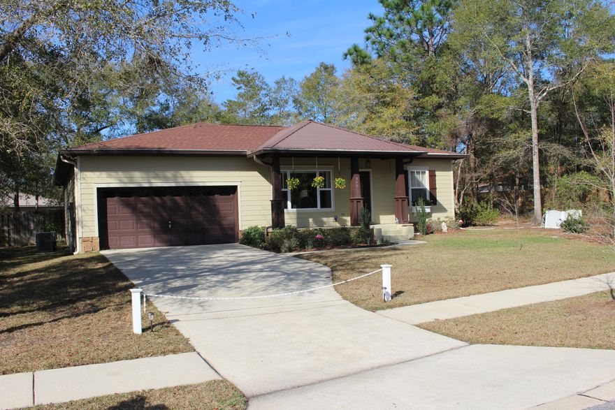 Well kept 3 bedroom, 2 bath home with 2 car garage and fenced in back yard. As you enter into the front door, you have an open concept from living room, kitchen and dining room. Master suite is on one side and 2 bedrooms with guest bathroom on the other. All bedrooms and living room have carpet. Dining area and kitchen have floating floors and bathrooms are vinyl. The office / bonus room has indoor / outdoor carpet. The master bedroom features a double vanity, tub shower combination. Guest bathroom has a single vanity and tub / shower combination. Fenced in back yard with 10 x 8 yard building. Kitchen appliances include refrigerator, cook top range and vented microwave. Home features agriculture water meter w/full yard irrigation. Enclosed rear porch includes a new storm door & hvac was increased to accommodate the new living space when it was built.  That is where the additional sq footage comes from.