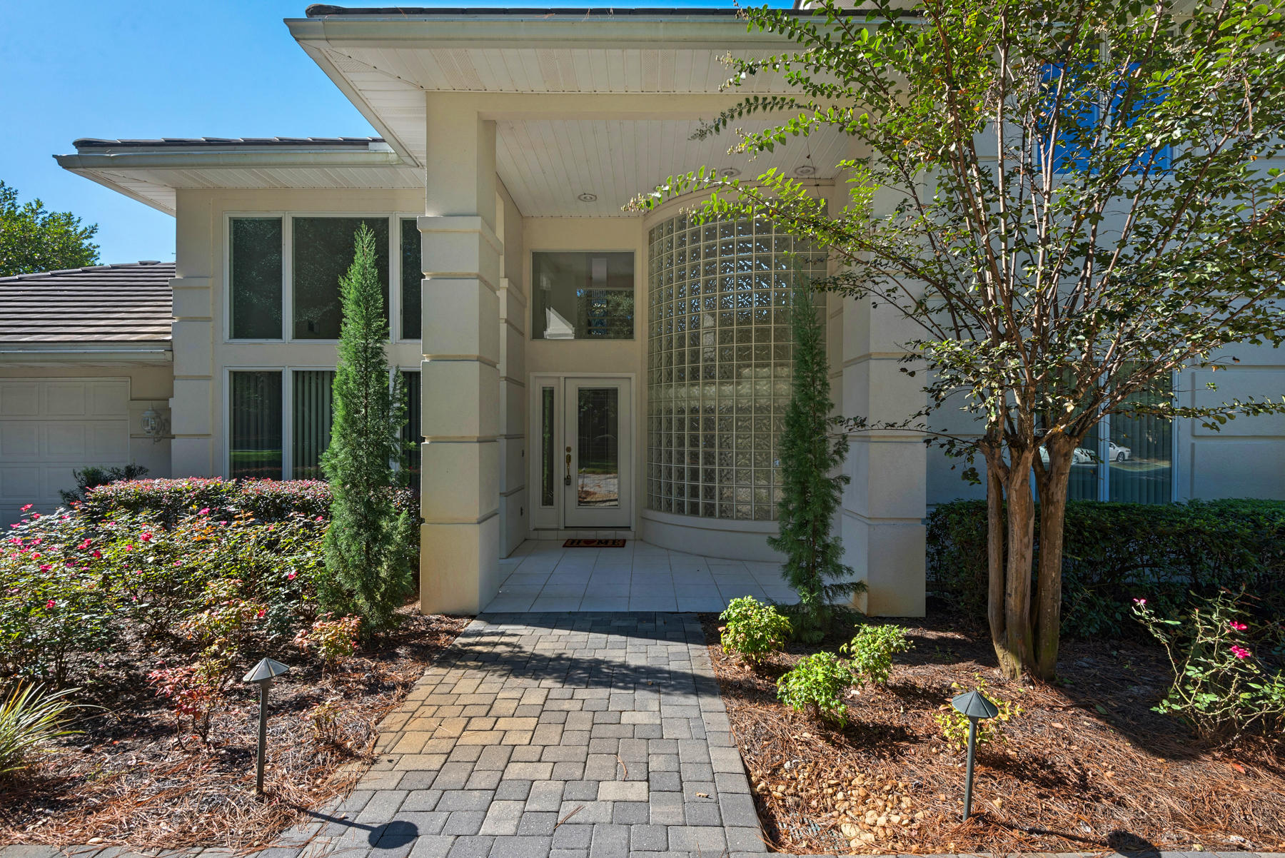 Seeking the ideal property? You've found it in this stunner! Lake views set the scene for what life will look like every day in this One-Of-A-Kind 4 bedroom, 3.5 bathroom estate located on one of the largest home sites in Bluewater Bay. (Professionally landscaped .80 acres). As you open the front door you will discover soaring ceilings with quality finishes that combine into a spectacular home. Approximately 3090 square feet of living space with custom finishes throughout including: gourmet kitchen with plenty of counter space and cabinets, all appliances included, giant pantry, center island and picture window captures the beauty of the outside while doing dishes. Great room invites with marble tile fireplace could be wood burning or gas. French doors open onto the covered patio that st