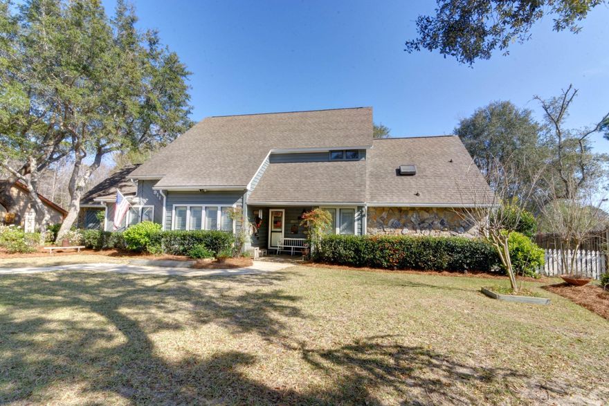 Pride of ownership shines throughout this wonderful family home. Very well maintained!!! 4/5 bedrooms, with master suite downstairs. Currently owner uses the additional downstairs guest room as an office. Open/large/cozy family room with a soaring stone fireplace that goes to the ceiling. Separate dining room with crown molding/chair rail/shutters. Country style eat in kitchen with island . Upgraded double oven/dishwasher/microwave/refrigerator. Enclosed rustic style sun room from the kitchen looks out to a well manicured backyard. Large master suite with beamed ceiling, hardwood floors/french doors leading out to a screened lanai with a hot tub...very cozy. Double vanities separated from one another/2 walkin closets/updated tiled shower in the last 2 years. Upstairs there are 3 additional good sized bedrooms and a full bath with a soaking tub.   Enjoy the 9 X 15 loft with beamed ceiling.  Over sized garage/central vac system/wainscot/wet sink/room for another refrg/painted floor/built in work station.  The laundry is combined with 1/2 bath downstairs with folding doors.  This bath could easily be made into a full bath; has all the necessary connections if someone wanted to have a full 3rd bathroom.  There are many additional features to this home.  Outside is a covered porch leading to the back yard/paver firepit area and walk way.  There is a 10X14 shed with water and electricity.  Owner has recently added granite in the kitchen and painted the cabinets, replaced the central vac system, new lawn pump motor.  You will be amazed when you view this property.  Please come and fall in love!!!