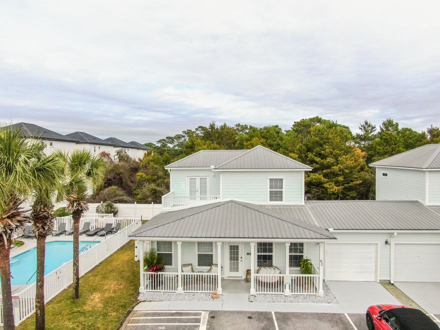 Welcome to Paradise. This beauty offers 3 Bedrooms, 2 1/2 Baths, 1 car garage. Located in the community of Miramar Palms, this stunning townhome boasts a prime location just blocks from the beautiful beaches of the Gulf of Mexico, making it the perfect place for those who love the sun, sand, and surf. Featuring an open-concept design with a first floor Master Bedroom, and lots of natural light streaming in from the abundance of windows. The living area is the perfect place to relax with family and friends, while the kitchen is fully equipped with stainless steel appliances and plenty of counter space for meal preparation. The second floor offers two bedrooms and a large Full Bathroom with New Tile Shower. Come and Soak in the sun on your private balcony overlooking the community pool.