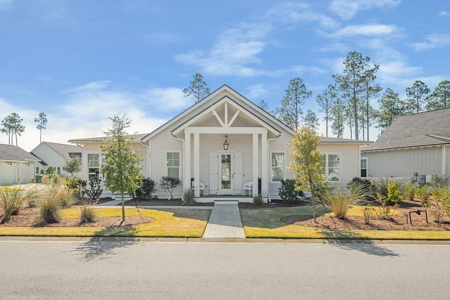 This coveted Origins Romair Custom Home offers a spacious single level floor plan and an oversized double garage with separate golf cart garage, outdoor cabana, fireplace, summer kitchen, pool and spa. The corner lot home is adjacent to a pocket park, with a community buffer behind, creating a peaceful private setting. The Style of finishes and furnishings were selected with the RH Design Group providing an inviting flow throughout.At the Foyer, a vista of the open Living/Dining/Kitchen area glides out to the adjacent screened porch through a wall of sliding glass doors.  The Chef's Kitchen enjoys an upgraded Wolf/SubZero package, separate bar area with wine cooler.  No stairways and minimum hallways enhance the grand impression.