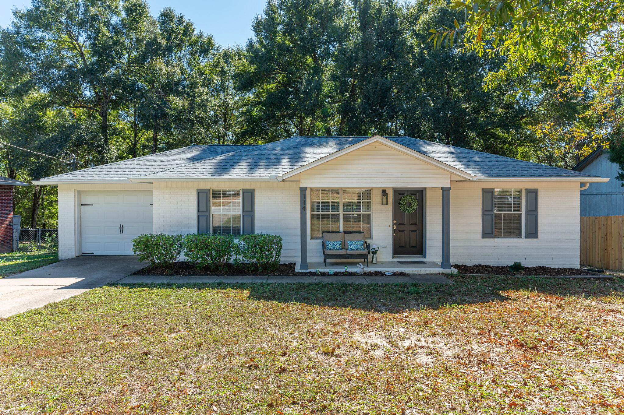 **Now Offering a $2,500 Closing Cost Credit** Nestled in the sought-after Adams Powell community, this all-brick home boasts a prime location within walking distance to Bob Sikes Elementary. The exterior's white brick and manicured landscape and front porch invite you into a move-in-ready haven. Recent upgrades include brand new water heater, HVAC in 2017, a new roof in 2020, stylish low-maintenance LVP flooring throughout, and remodeled kitchen and bathrooms. Freshly painted with updated fixtures, this home features a spacious master bedroom with a large walk-in closet. Step onto the expansive back deck overlooking a generous, fully fenced lot just over 1/4 acre. Great location, peaceful neighborhood, fully remodeled, and truly move in ready!