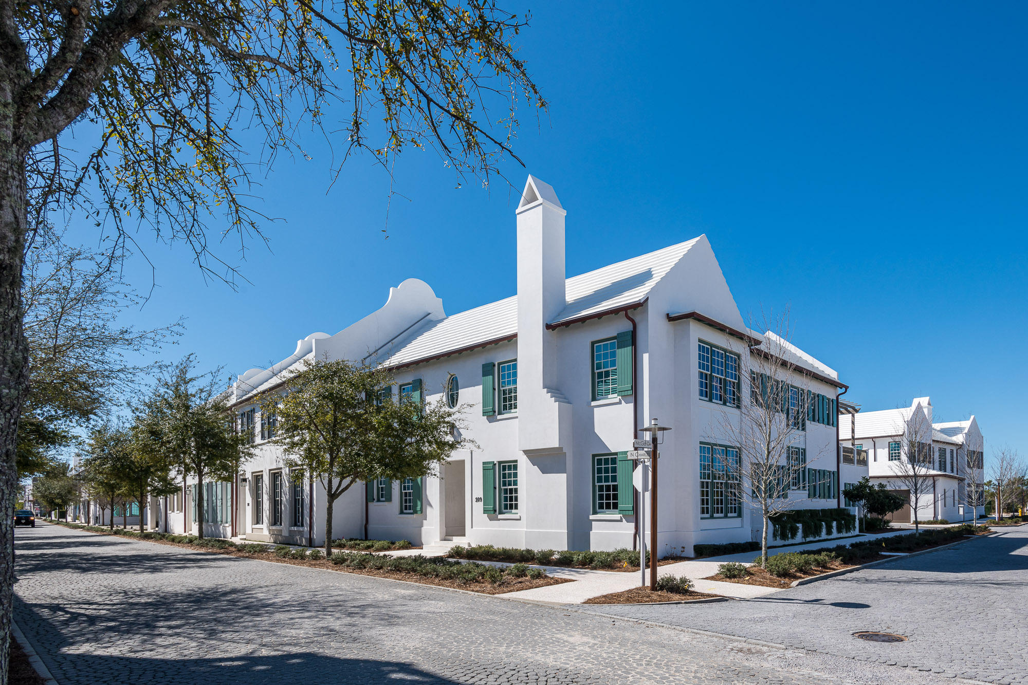 This corner home by Sommer Design Studios, Architect is located on the corner of North Charles Street and South McGee Drive and a straight walk to the Gulf of Mexico. Conveniently located to Caliza Pool, ZUMA, and Town Center, this home boasts its own private courtyard, covered loggia and pool. The open floor plan features a gracious Living Room with fireplace and kitchen. The first floor boasts two Guest Bedrooms and two car garage. The second floor has spacious Master Bedroom and an additional guest Bedroom with Flex Room, and Family room that opens to a Rooftop Terrace with summer kitchen and fire pit. Home is being offered fully furnished by Urban Grace Interiors.