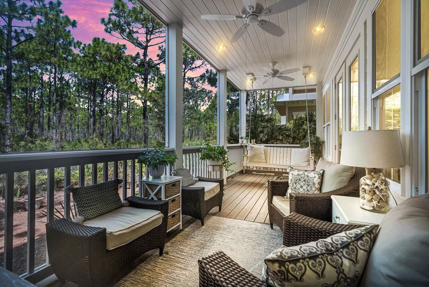 Best priced Cottage Collection home! Welcome to 9 Beargrass Way, a stunning coastal retreat nestled within the enchanting community of NatureWalk at Seagrove. This exceptional 4-bedroom, 3.5-bathroom haven is a true embodiment of serenity and comfort, offering an array of features that epitomize the perfect beachside lifestyle.Step inside and be captivated by the warmth of solid pine floors that lead you through this thoughtfully designed home. As you explore, you'll discover four covered porches that beckon you to unwind and savor the coastal breeze. The back porch, a screened sanctuary, provides a picturesque vista overlooking the tranquil expanse of Point Washington Forest - a breathtaking backdrop that merges seamlessly with your living space.
