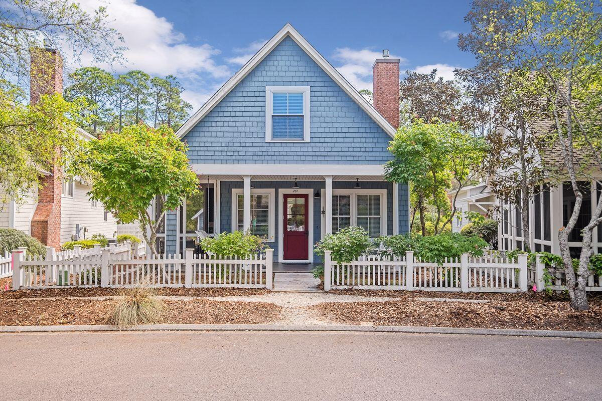Located in one of South Walton's most prestigious communities, this charming two-story beach cottage is a quick stroll from the beach. One unique advantage of this home is the generous lot, which has a garage at the rear of the property and there's still room to add a private pool. Architect-drawn plans are available. This colorful Nantucket-style home is beautifully appointed and has tasteful new furniture to enhance the laid-back Florida lifestyle. Brand new hardwood flooring and soaring ceilings give a sense of light and space to the open floor plan while multiple windows showcase garden views. The great room is a wonderful gathering space with a cozy fireplace feature for cooler nights. There's an adjoining dining room for celebrations and special meals.