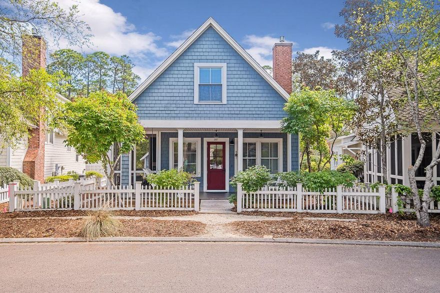 Located in one of South Walton's most prestigious communities, this charming two-story beach cottage is a quick stroll from the beach. One unique advantage of this home is the generous lot, which has a garage at the rear of the property and there's still room to add a private pool. Architect-drawn plans are available. This colorful Nantucket-style home is beautifully appointed and has tasteful new furniture to enhance the laid-back Florida lifestyle. Brand new hardwood flooring and soaring ceilings give a sense of light and space to the open floor plan while multiple windows showcase garden views. The great room is a wonderful gathering space with a cozy fireplace feature for cooler nights. There's an adjoining dining room for celebrations and special meals.