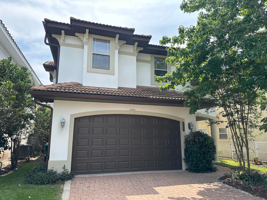 Beautiful 3 bedroom/ 2.5 bath home located in the wonderful community of Calusa Bay. This Mediterranean accented home has all the features you want in a custom-built design. With tile flooring downstairs, luxury carpeted flooring upstairs, custom design window trim, 10 foot ceilings with crown molding throughout, and a fresh coat of paint, this home is practically new. Downstairs is an open floor plan containing a living room, dining room, breakfast bar, kitchen and French Doors that open into your back yard. The kitchen has granite counter tops, stainless steel appliances including a brand new stove, and a large built in pantry. The dining area sits next to your sunlit bay window looking into your back-yard.