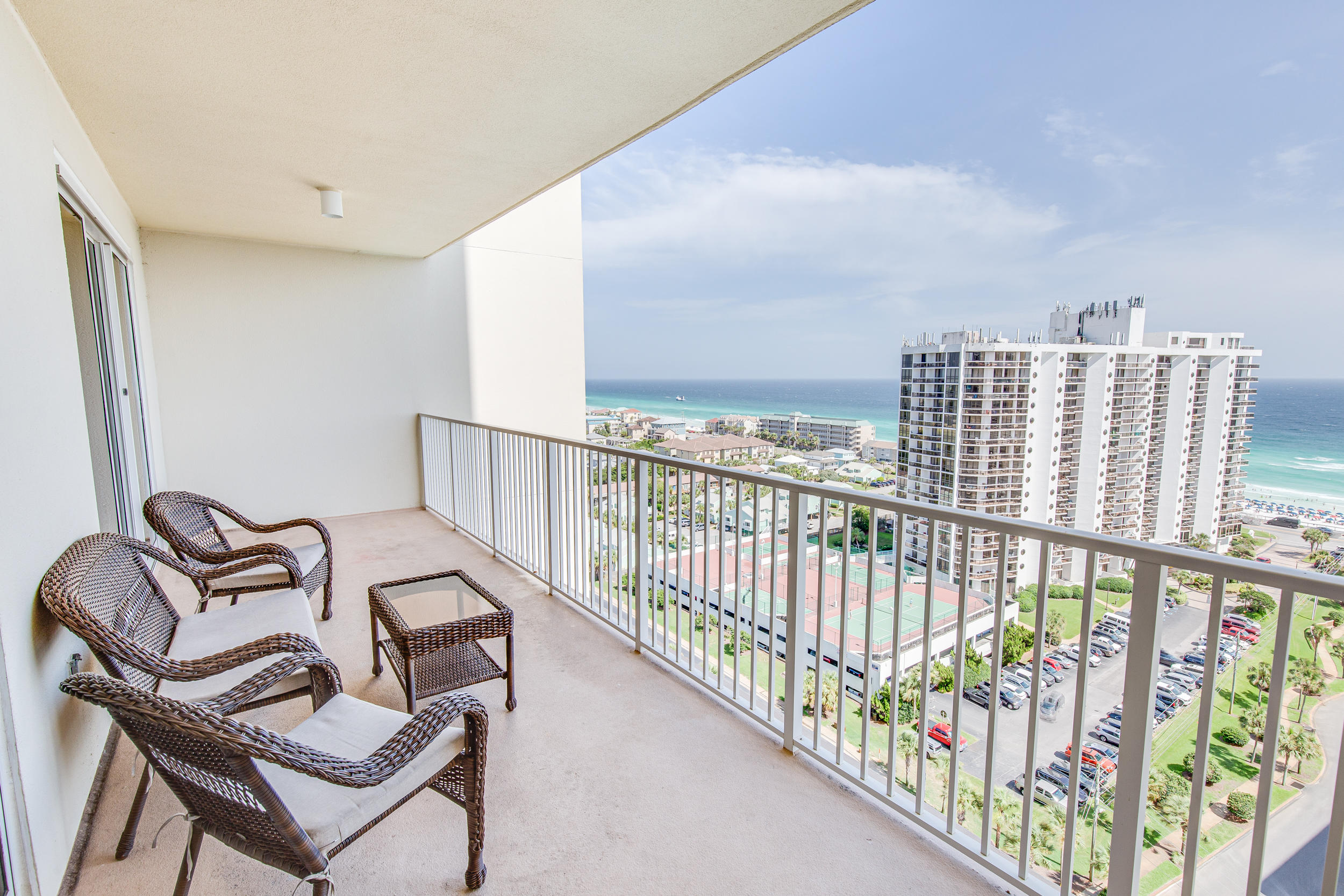 RENTAL PROJECTIONS OF $32-37,000 FOR 2020! SWEEPING VIEWS OF COASTLINE FROM THIS DESIRABLE 15TH FLOOR CONDO JUST STEPS FROM THE BEACH. This unit is fully-furnished & turnkey ready. The kitchen sports granite counter tops & pretty natural wood cabinets. The living area & the master bedroom both have access to the balcony. There is also a stackable washer & dryer in the laundry room for your convenience. HVAC was replaced in 2018. Ariel Dunes is a signature complex with two towers located in the gated community of Seascape Resort. Amenities include 2000 feet of deeded white sand beach, three large pools, onsite restaurant, golf, tennis, fitness room, & a conference center. Conveniently located to Seascape Towne Center, additional shopping, restaurants, & an 18-hole golf course.