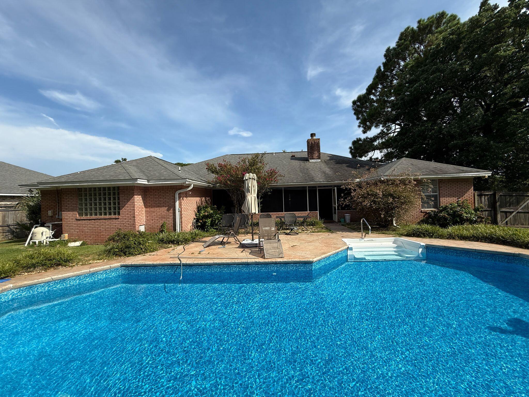 Spacious 4-Bedroom Home with Pool on Oversized Lot!Welcome to this beautifully upgraded 4-bedroom, 2-bath home, perfectly situated on a large lot with thoughtful features and custom touches throughout. Located just minutes from local military bases, within walking distance of the elementary school, and close to shopping, dining, and entertainment, this home offers both comfort and convenience.Inside, you'll find a desirable split-bedroom floor plan, a formal dining room, a dedicated den or office, and a spacious family room with vaulted ceilings and a cozy gas-log fireplace. Tile flooring runs through the foyer, kitchen, breakfast nook, laundry room, and bathrooms, offering durability and style.The kitchen is large and functional, featuring plenty of cabinet space, a center island, and a bright breakfast area. The primary suite includes a luxurious en-suite bathroom with a double vanity, whirlpool tub, and separate shower. Three guest bedrooms share a full guest bath on the other side of the living room, ensuring privacy in the primary.
Step outside to enjoy the expansive 33' x 12' screened-in porch, which overlooks a fully fenced backyard with a sparkling 21' x 36' in-ground pool -- ideal for relaxing or entertaining. Pool and lawncare are included!
This is a non-smoking and non-vaping home. Small pets may be considered with owner approval and a non-refundable pet fee.
This home truly offers the perfect blend of space, comfort, and location. Don't miss out. Schedule your showing today!