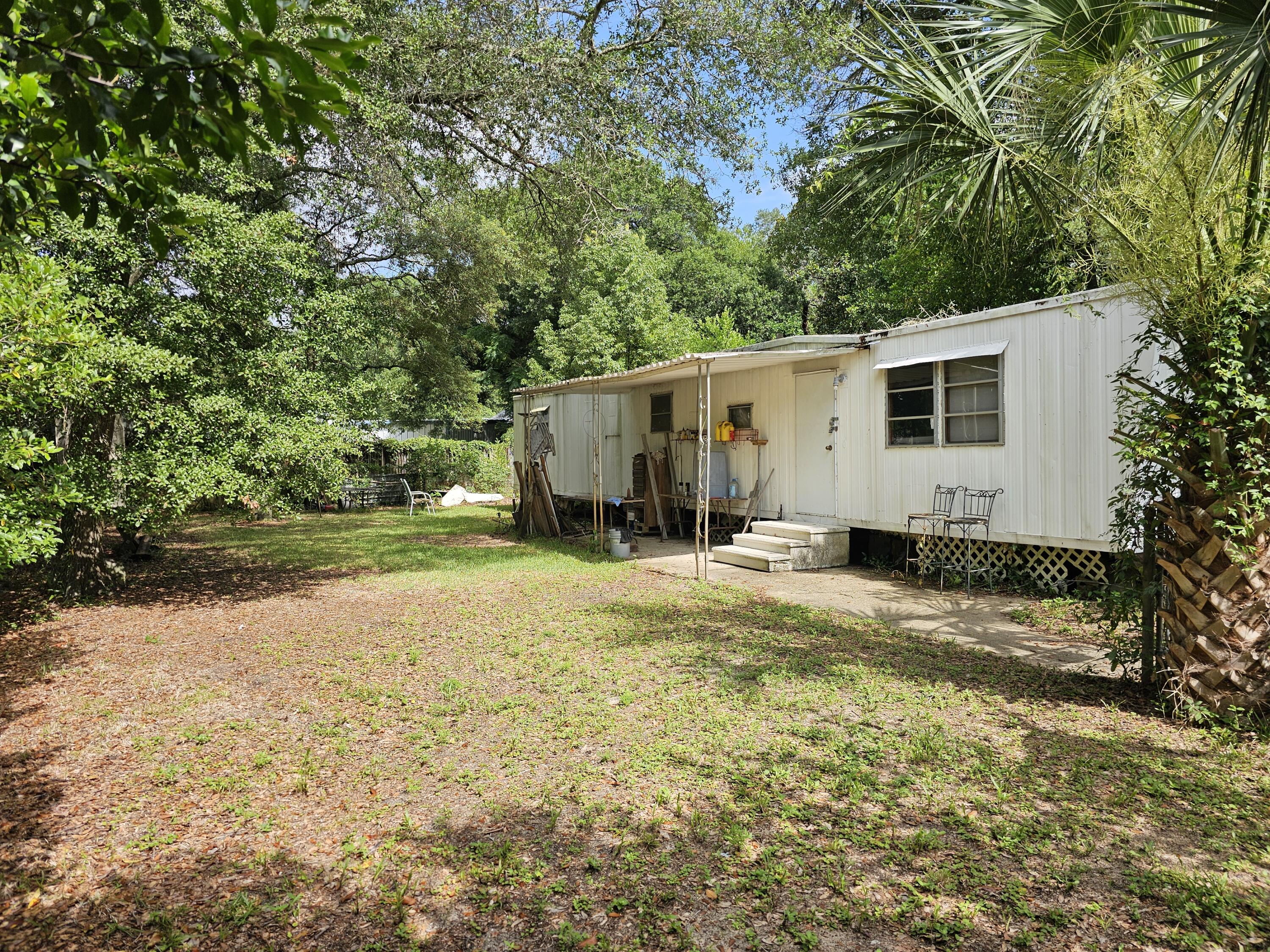 CASH ONLY......Property is being sold ''As Is, Where Is''. An approximate .23 acre lot with 2 mobile homes. SELLERS HAVE NEVER OCCUPIED THE PROPERTY AND ARE ONLY AWARE OF CONDITIONS THAT ARE READILY OBSERVABLE. Trailer 1 is appears to be habitable while Trailer 2 is not without major renovations. Location presents opportunities as it is located close to Eglin AFB, Hurlburt Field, schools, restaurants shopping It is further acknowledged that the Mobile Homes are being sold without titles. INTERIOR PHOTOS ARE OF TRAILER 1. Buyer(s) responsible for verifying any and all information they deem important.