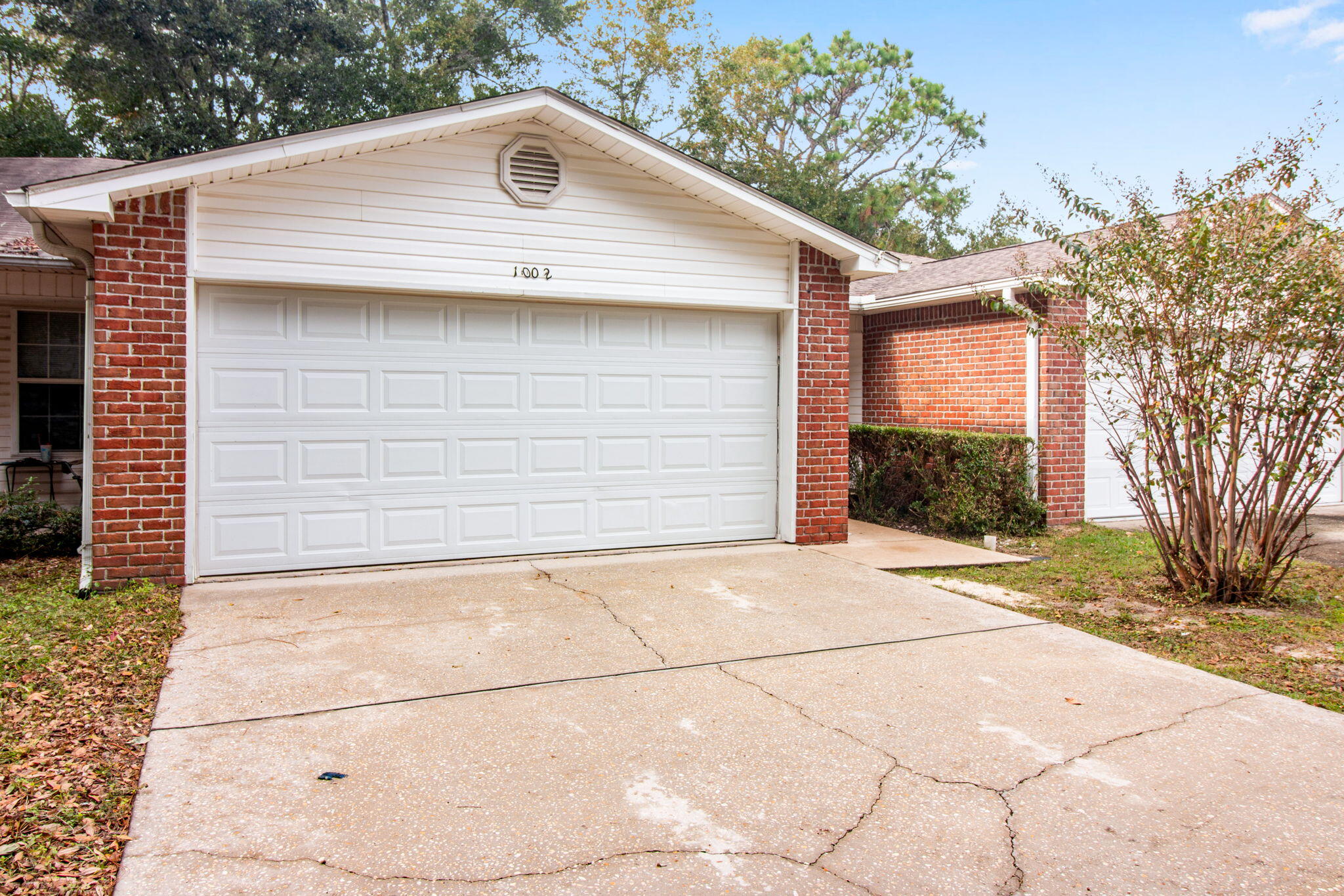 This charming 2BR/2BA home has been freshly painted and ready for move in. You will adore living in this delightful garden home, conveniently located in the heart of Fort Walton Beach. Pull into your two-car garage and begin to experience life as a resident of the well-kept Cotton Tree Community.The home features an open and inviting living room, perfect for quiet evenings at home spent with your family or even grand events. The master bedroom continues the feeling of openness and additionally offers a large walk-in closet and adjoining bathroom with double vanities. Outside you will find a partially fenced backyard, great for your pets to run around. This home is not far from area shops, restaurants and both Air Force bases, not to mention the beautiful beaches of the Gulf Coast.