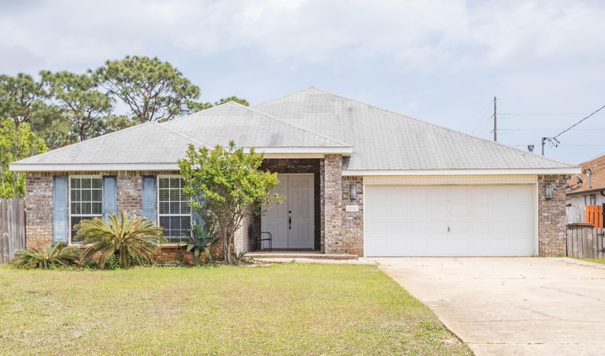 THIS FABULOUS HOME IS JAM PACKED WITH SPECIAL FEATURES.  THE BEAUTIFUL FLOORING IN MAIN LIVING AREAS- LG PORCELAIN TILE W/ SEVERAL TRAVERTINE MOSAICS. LIVING RM HAS 10 FT CEILINGS, WOOD BURNING FIREPLACE & A 13+ FOOT WALL FOR A GERMAN SHRUNK. GRAND KITCHEN W/ NUMEROUS CABINETS, CENTER ISLAND, WALK-IN PANTRY, STAINLESS STEELE APPLIANCES, BKFAST BAR & BUILT IN DESK. SPLIT BEDRM PLAN FOR EXTRA PRIVACY. LG MASTER SUITE W/ DOUBLE VANITY SINKS, GARDEN TUB, SEPARATE SHOWER, PLUS 2 WALK-IN CLOSETS W/ ORGANIZERS & SHELVING. SIT BACK & RELAX IN YOUR SCREENED PORCH.THE BACK PATIO IS GREAT FOR SUMMER RELAXATION AND FRIENDLY ENTERTAINMENT.  THIS HOME IS CONVENIENT DISTANCE FROM LOCAL SHOPPING.  YOU HAVE TO SEE IT TO APPRECIATE IT.