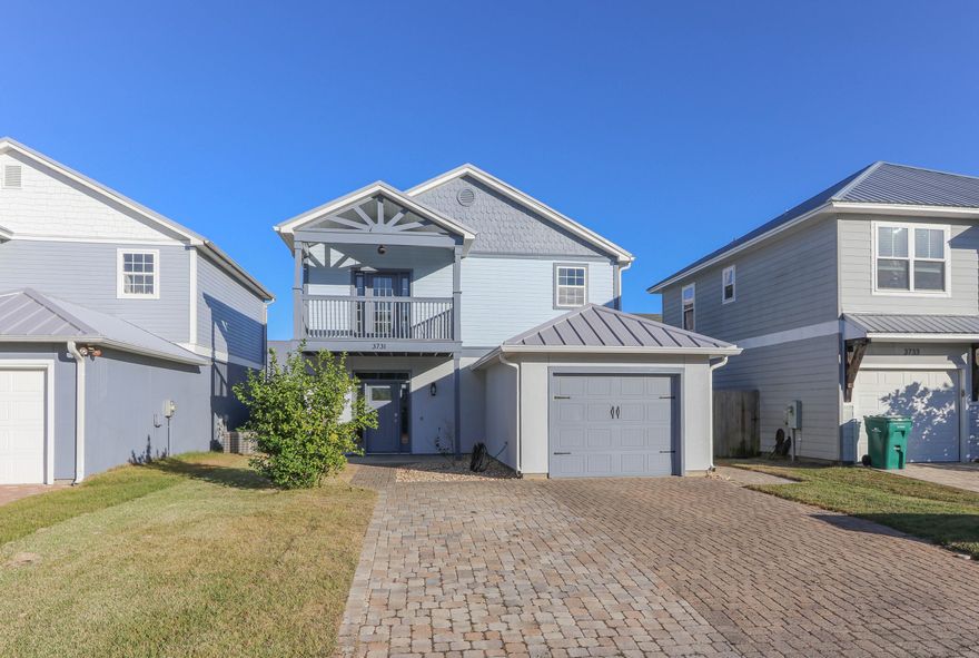 Just steps from Grand Lagoon & a mile from Panama City Beach's sugar-white sands, this renovated home is a must-see. Nestled on a quiet dead-end street off North Lagoon with a community pool, it offers luxury plank flooring throughout (no carpet!) and a first-floor bedroom for guests or a home office. The oversized master suite features dual closets, a private sunset-view balcony, and a spa-like ensuite. Two additional bedrooms share a Jack-and-Jill bath. Updates include a refreshed kitchen, new exterior paint, upgraded fixtures, and an air-conditioned garage with an EV charger. The low-maintenance backyard boasts a covered deck, perfect for entertaining. Unbeatable value, space, and style in a prime location near restaurants and the Beach.