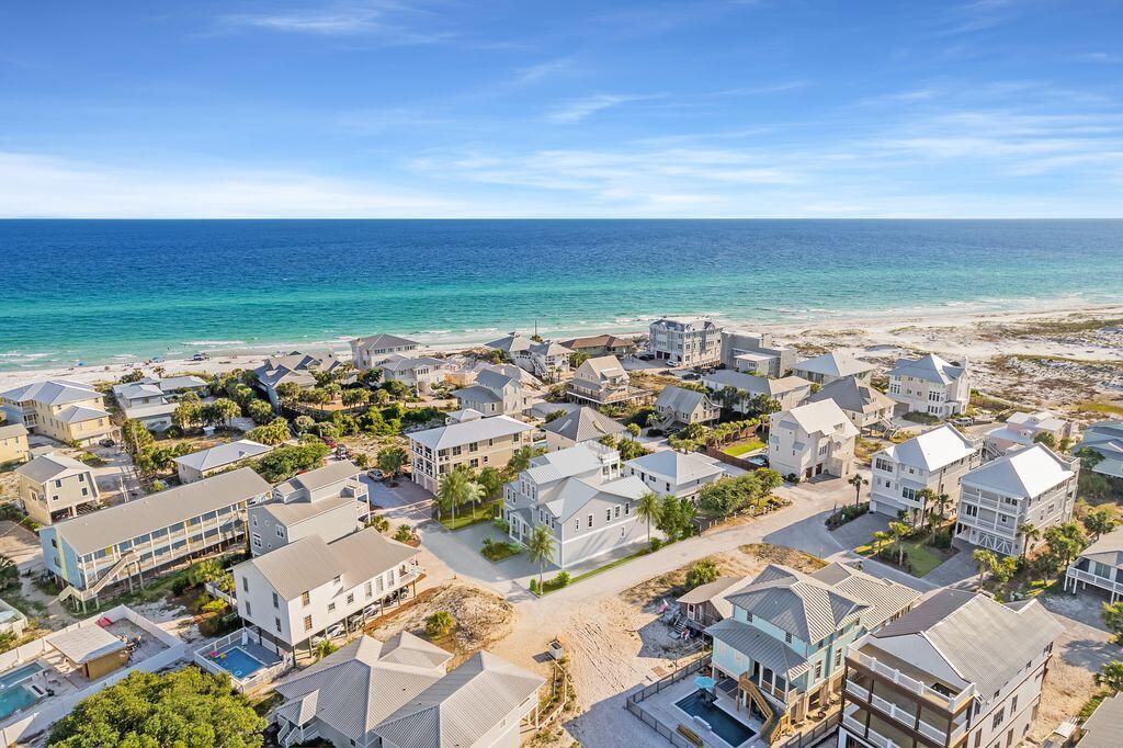 Rare opportunity to purchase an oversized homesite in Grayton Beach. Situated within a few steps of the sugar white sands, this property is offered with a permit ready set of plans for an approximately 6500 sqft home with private pool. Future homeowners will enjoy panoramic views of the emerald waters, rolling dunes and breath-taking sunsets. Homesites of this nature and size rarely come available in Grayton Beach. The iconic Red Bar as well as Chiringos, Zoo Gallery and more are all within a short walk of this property. Do not miss the opportunity to create your dream home!