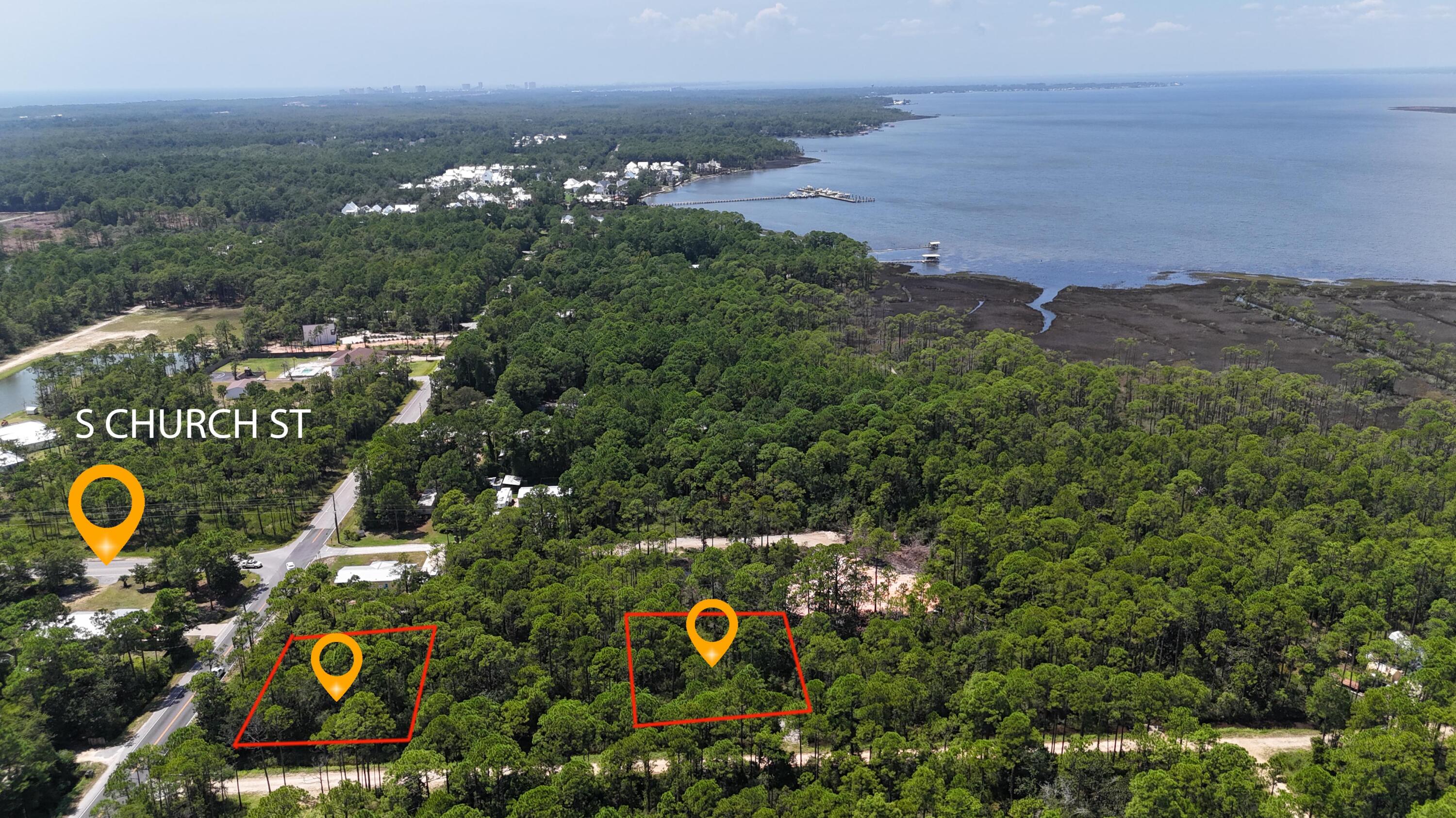 Welcome to your future oasis! This remarkable double lot off Churchill Bayou Rd in Santa Rosa Beach presents an incredible opportunity for those looking to create their ideal coastal retreat. With its prime location, you'll find yourself just a short drive from the latest restaurants and shops, ensuring all your needs are met without straying far from home.The property is just 3 miles from a public boat launch, making it a water enthusiast's dream. Spend your weekends boating, fishing, or simply enjoying the breathtaking views of the Gulf and nearby waterways. With plenty of room to breath, this double lot offers endless possibilities for your new construction--be it a charming beach cottage or a modern luxury home.  Embrace the relaxed lifestyle that Santa Rosa Beach is known for, where you can enjoy both the serenity of nature and the excitement of community amenities. This is your chance to secure a prime piece of real estate in a coveted beach towndon't let it slip away!
 Water and sewer available at Churchill Bayou Rd .