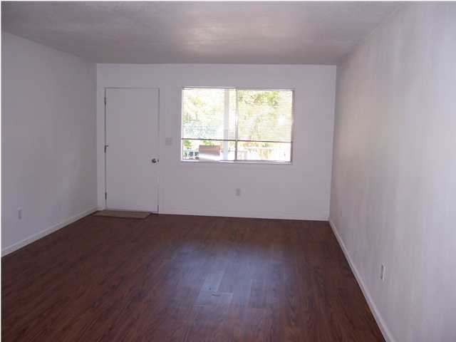 Like new unit with Laminate flooring in Living area, Kitchen/Dining, Bedrooms are carpeted. All new Bath room. Close to College, shops and Bases. Spacious open plan. Living Room, Dining/Kitchen area, work area and lots of Cabinets. Master Bedroom has two good size closets. Laundry facilities are available in the complex by Swimming Pool. Rent includes Water. NON SMOKING UNIT. NO PERS. CABLE IS TENANTS RESPONSBILITY.
