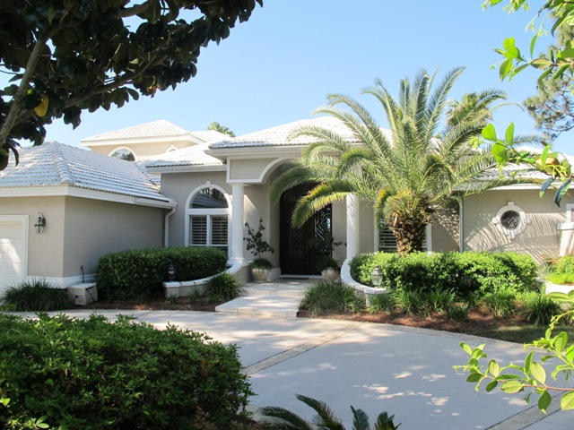 Luxuriate in this Mediterranean-inspired bayfront home with unrivaled sunset views of Destin. From the beautifully landscaped circular drive you will enter through massive leaded glass doors. A wide-open floor plan features 9-12 foot ceilings, travertine and hardwood floors, granite countertops, and views from nearly every room of the tropical setting of the screened pool, spa and fountain, and the bay beyond. Push open three sets of glass doors and expand the living space to the covered and screened pool deck. Cozy family room has a gas fireplace and built-in bookshelves. Three bedroom suites, each with its own full bath, are placed for maximum privacy. The poolside master suite is accessed through an arched passageway. Here a half bath serves pool guests. The elegant master bath has an