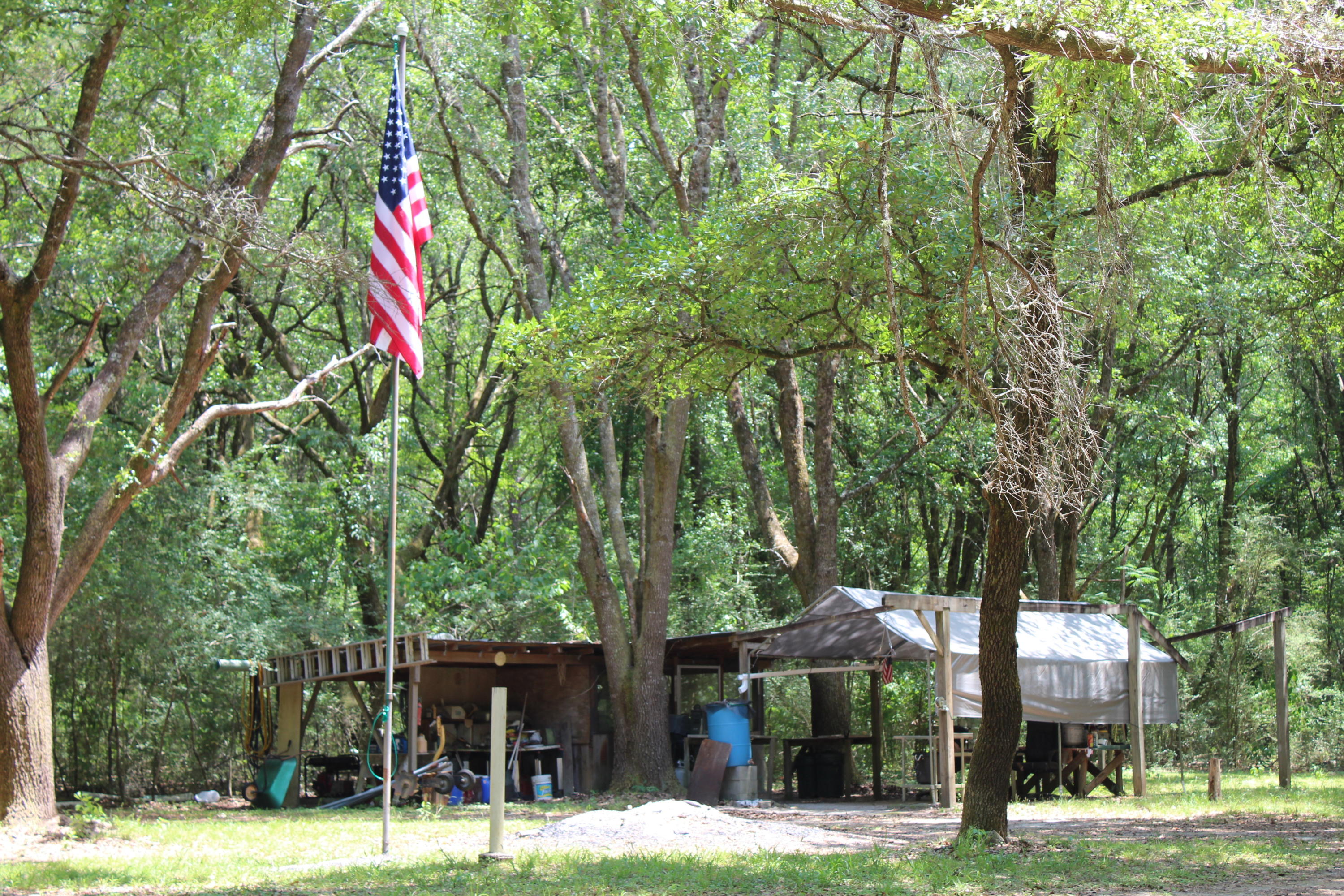 Attention hunters, nature lovers, and outdoor enthusiasts! You will love this 120 acre wooded parcel designed by the seller to be a first class hunting camp. There is an abundance of deer, turkey and wild boar on the property. Custom trails have been cut through out the property making travel easy to get to your deer stand or hunting area. Seller has built specific areas for rifle and handgun target practice that includes covered shooting tables and custom built metal targets. You have got to see the three story high shooting house built to serve as the sellers own private cabin in the woods high above the ground ! shown by appointment. 24 hours notice mandatory. No signs are posted. Cannot see from the road.