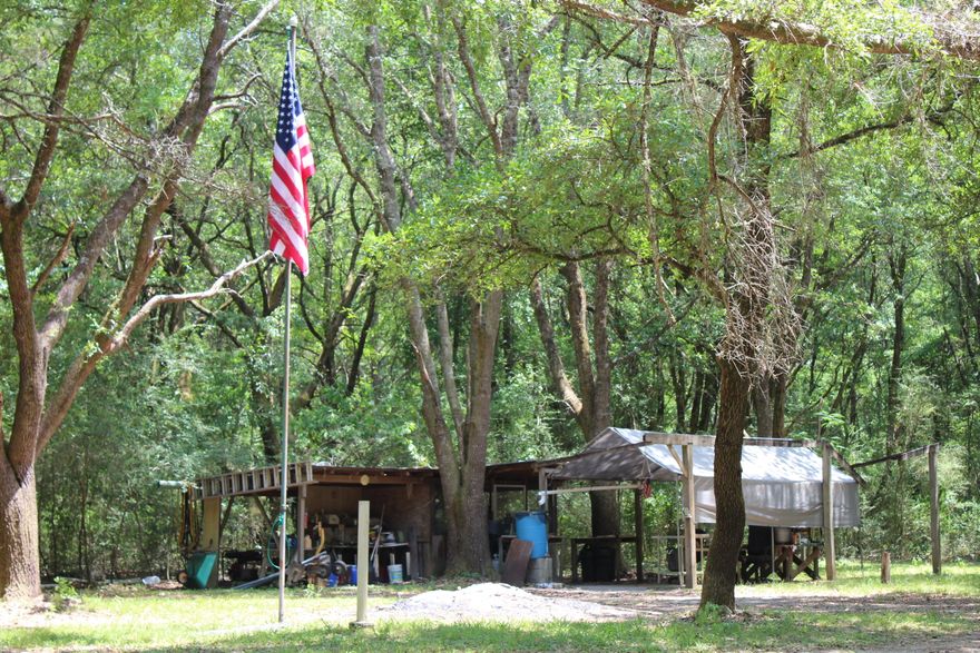 Attention hunters, nature lovers, and outdoor enthusiasts! You will love this 120 acre wooded parcel designed by the seller to be a first class hunting camp. There is an abundance of deer, turkey and wild boar on the property. Custom trails have been cut through out the property making travel easy to get to your deer stand or hunting area. Seller has built specific areas for rifle and handgun target practice that includes covered shooting tables and custom built metal targets. You have got to see the three story high shooting house built to serve as the sellers own private cabin in the woods high above the ground ! shown by appointment. 24 hours notice mandatory. No signs are posted. Cannot see from the road.