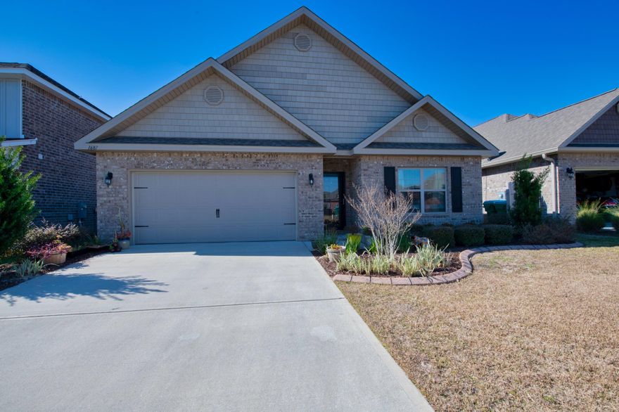 Beautiful home in a great neighborhood in Gulf Breeze! Step inside to see the home open up into the kitchen, dining and living areas. The kitchen features granite countertops and breakfast bar. Across the tile floor is the main living area with trey ceiling, fan and a large window to bring in an abundance of natural light. The master bedroom has a private en-suite with walk-in closet, double vanity and separate shower and tub. The other 3 bedrooms and second bathroom give plenty of space for the entire family. Spend your days enjoying the natural view from the covered patio with the privacy of your partially fenced yard. Schedule your showing today and let us welcome you home!