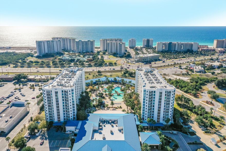 Exquisite 8th floor unit w/Gulf and resort views at highly desired Palms of Destin Resort and Conference Center. This unit has been updated to include, new granite in the kitchen & baths, new faucets, sinks, glass backsplash, under counter lighting, above cabinet lighting & stainless appliances! AC, water heater & washer/dryer only a few years old. Ceiling fans in the living room and master and a chandelier accents the dining room area. Rental projections over $40K! Short walk to the beach, the resort features a state of the art fitness center, parking garage,resurfaced tennis crts & pickle ball! Lagoon pool plus heated pool! Want room service? No problem, on site restaurant delivers to your unit and the pool! Buyer to verify all info. HOA fees cover ALL utilities incl. electricity.