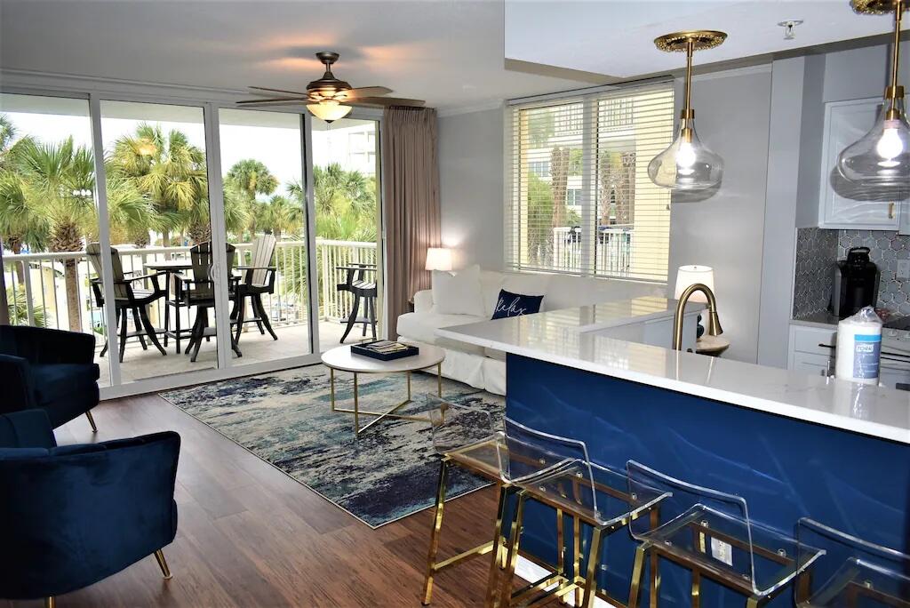 Beautifully rennovated unit in popular rental destination - Destin West Bayside! This unit has new LVP flooring, stainless steel appliances, a new AC, gorgeous tile backsplash, updated counter tops and more! Destin West complex is known for its access to both the Bay and the Gulf (via the sky walk) as well as its large lazy river. Excellent rental history and maintained well by owners - this unit is a must see for the savvy investor or buyer looking for a personal vacation home. ~Buyer to verify all measurements.~