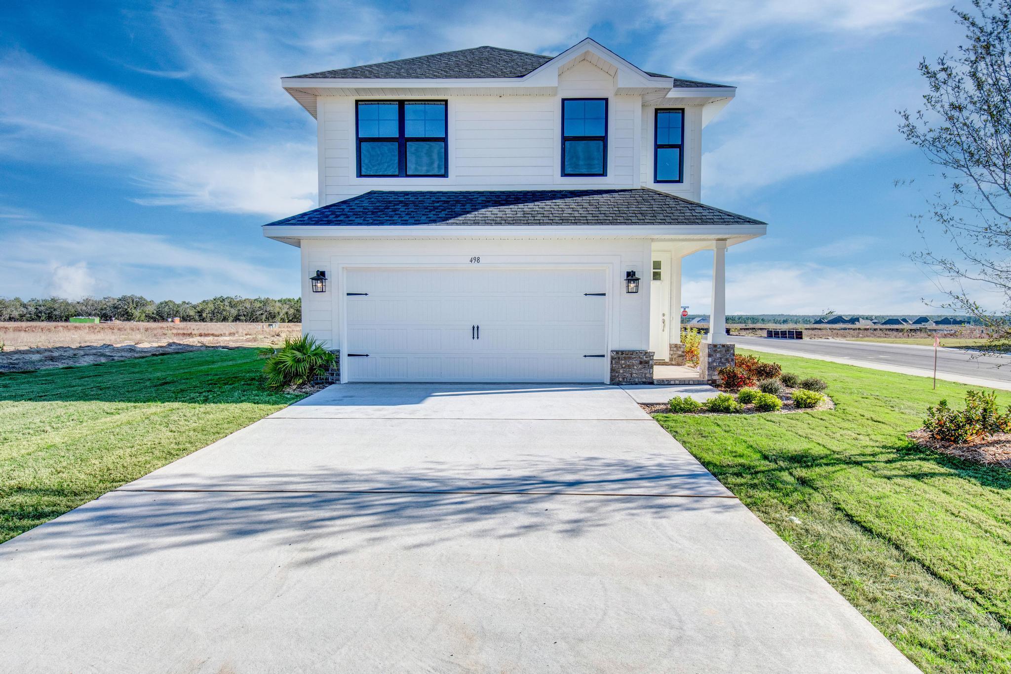 Builder is currently offering 4.99% mortgage rate for FHA or VA buyers. Just a 20 minute drive to South Walton beaches, 5 minutes to Publix or 10 to WalMart.  Popular Craftsman 4 BR/ 2.5 BA home with Hardiboard siding and brick skirt. Interior features 9' ceilings on first floor and 8' upstairs, 8' entry doors. Tray ceiling in master bedroom with a large walk-in closet. Durable CoreTec Pro Plus vinyl plank flooring on the entire main floor and in wet areas upstairs. Seller pays most closing costs with a seller-approved lender.  Community Pool will be built by developer at a future date.
